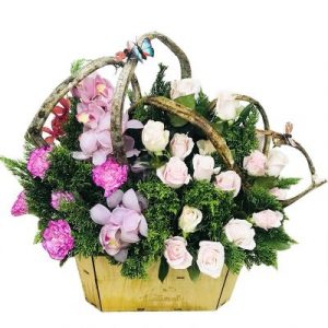 A basket of dedicated pink and white roses