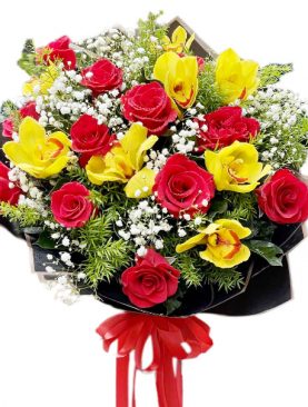 A Dozen of Red roses, Six yellow Orchids Accented with Assorted greenery